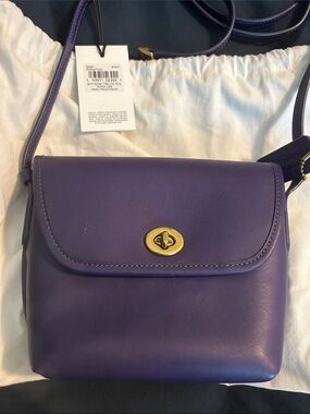 Coach limited edition purple leather Turnlock Pouch with crossbody strap